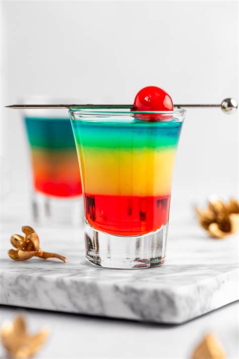 Layered cocktail in shot glasses