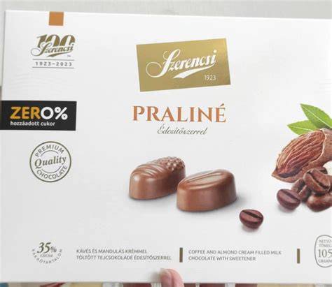praliné tejcsokoládé bevonattal és mogyoródarabokkal